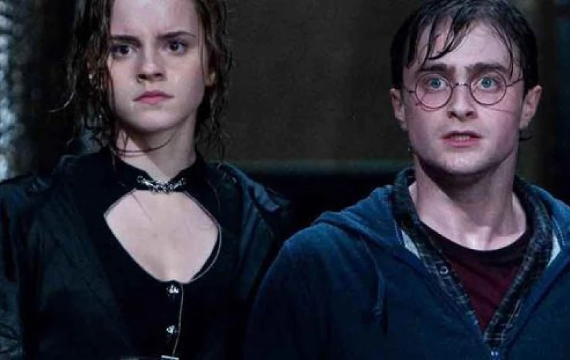 Image from a scene in Harry Potter 5 where Hermione and Harry have a surprised look on their faces, looking displeased.